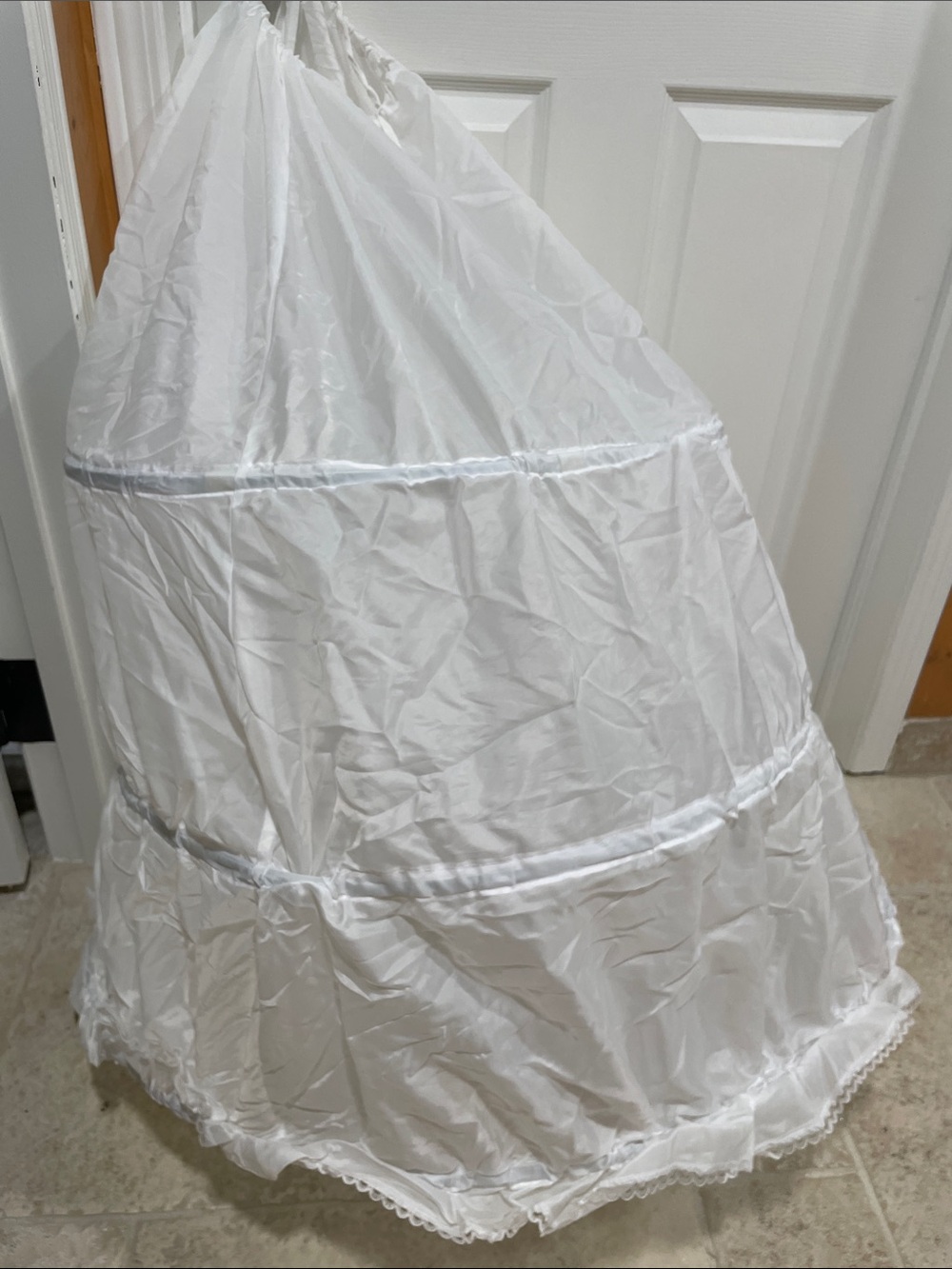 Mitchell from Kleinfeld white hoop skirt